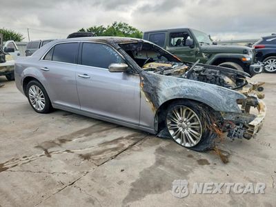 Czwarte zdjęcie samochodu z boku: 2014 CHRYSLER 300C VIN:2C3CCAKT6EH273386 - miniatura