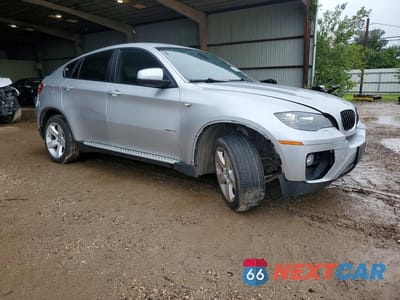 Czwarte zdjęcie samochodu z boku: 2014 BMW X6 XDRIVE35I VIN:5UXFG2C51E0K41404 - miniatura
