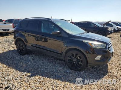 Czwarte zdjęcie samochodu z boku: 2017 FORD ESCAPE SE VIN:1FMCU0GDXHUC10504 - miniatura
