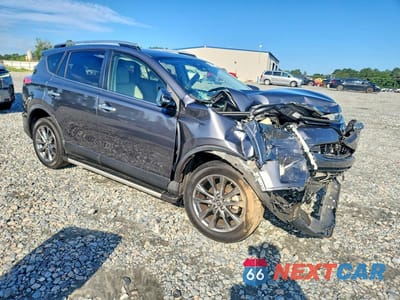 Czwarte zdjęcie samochodu z boku: 2018 TOYOTA RAV4 LIMITED VIN:JTMYFREVXJJ154270 - miniatura