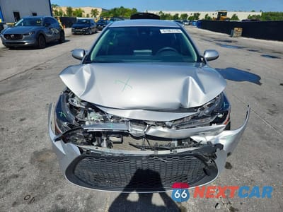 Piąte zdjęcie samochodu w środku: 2022 TOYOTA COROLLA LE VIN:JTDEPMAE2N3023563 - miniatura