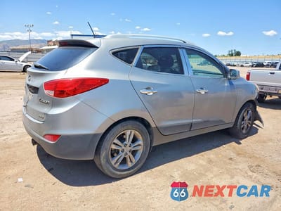 Trzecie zdjęcie samochodu z tyłu: 2010 HYUNDAI TUCSON GLS VIN:KM8JUCAC1AU052763 - miniatura