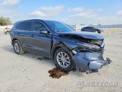 Czwarte zdjęcie samochodu z boku: 2023 HONDA CR-V EXL VIN:2HKRS4H7XPH432070 - miniatura