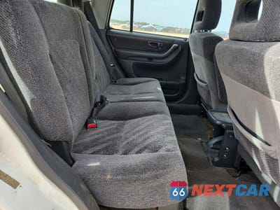 Zdjęcie 11 z 13 samochodu: 1999 HONDA CR-V LX VIN:JHLRD2846XC003785 - miniatura