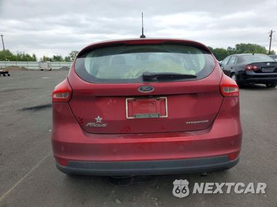 Zdjęcie 6 z 13 samochodu: 2016 FORD FOCUS TITANIUM VIN:1FADP3N21GL301769 - miniatura
