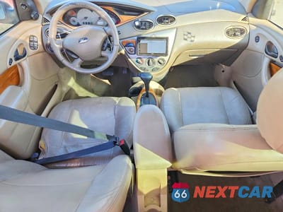 Zdjęcie 8 z 13 samochodu: 2003 FORD FOCUS ZTS VIN:1FAHP38Z13W292462 - miniatura