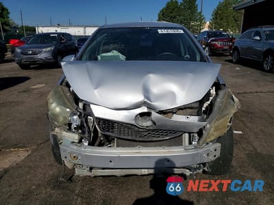 Piąte zdjęcie samochodu w środku: 2012 TOYOTA YARIS 5-DOOR SE VIN:JTDKTUD32CD533119 - miniatura