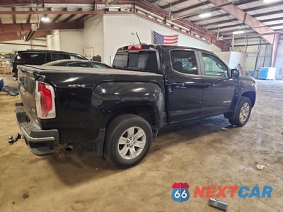 Trzecie zdjęcie samochodu z tyłu: 2016 GMC CANYON SLE VIN:1GTG6CE31G1175685 - miniatura