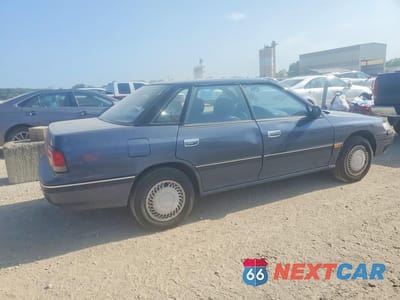 Trzecie zdjęcie samochodu z tyłu: 1993 SUBARU LEGACY L VIN:4S3BC6331P9648428 - miniatura