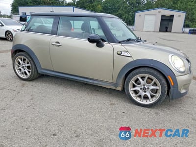 Czwarte zdjęcie samochodu z boku: 2007 MINI COOPER S VIN:WMWMF73577TL83361 - miniatura