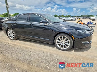 Czwarte zdjęcie samochodu z boku: 2016 LINCOLN MKZ HYBRID VIN:3LN6L2LU7GR622192 - miniatura