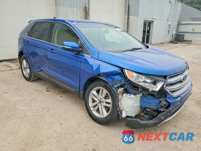 Czwarte zdjęcie samochodu z boku: 2018 FORD EDGE SEL VIN:2FMPK4J96JBB57637 - miniatura