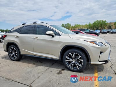 Czwarte zdjęcie samochodu z boku: 2016 LEXUS RX 350 VIN:JTJBZMCA5G2012330 - miniatura