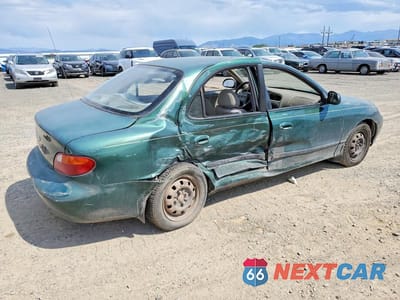 Trzecie zdjęcie samochodu z tyłu: 1997 HYUNDAI ELANTRA BASE VIN:KMHJF24M0VU594077 - miniatura