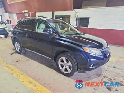 Czwarte zdjęcie samochodu z boku: 2010 LEXUS RX 350 VIN:2T2BK1BAXAC074317 - miniatura