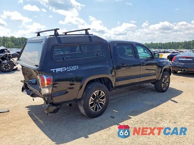 Trzecie zdjęcie samochodu z tyłu: 2021 TOYOTA TACOMA TRD SPORT VIN:3TYCZ5AN2MT022633 - miniatura