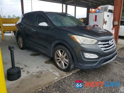 Czwarte zdjęcie samochodu z boku: 2014 HYUNDAI SANTA FE SPORT 2.0T VIN:5XYZU3LA5EG194253 - miniatura
