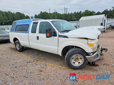 Czwarte zdjęcie samochodu z boku: 2014 FORD F250 SUPER DUTY VIN:1FT7X2A63EEB58965 - miniatura