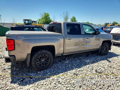 Trzecie zdjęcie samochodu z tyłu: 2017 CHEVROLET SILVERADO K1500 LT VIN:3GCUKREC4HG279785 - miniatura