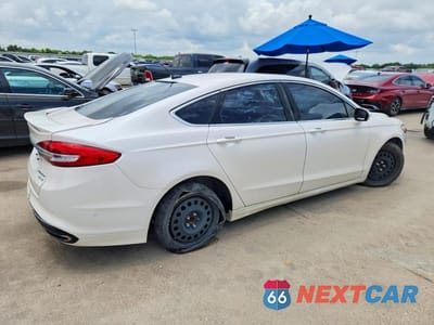 Trzecie zdjęcie samochodu z tyłu: 2017 FORD FUSION TITANIUM VIN:3FA6P0K91HR266775 - miniatura