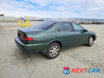Trzecie zdjęcie samochodu z tyłu: 1999 TOYOTA CAMRY LE V6 VIN:JT2BF22K1X0181601 - miniatura
