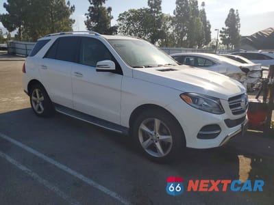 Czwarte zdjęcie samochodu z boku: 2016 MERCEDES-BENZ GLE 350 VIN:4JGDA5JB2GA749622 - miniatura