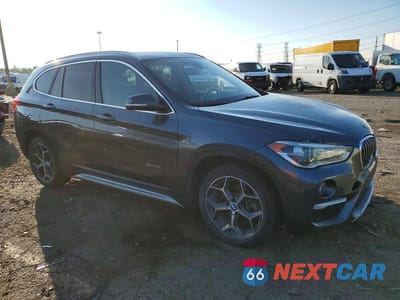 Czwarte zdjęcie samochodu z boku: 2017 BMW X1 XDRIVE28I VIN:WBXHT3Z3XH4A65618 - miniatura