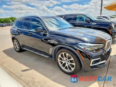 Czwarte zdjęcie samochodu z boku: 2023 BMW X5 XDRIVE45E VIN:5UXTA6C07P9N92753 - miniatura