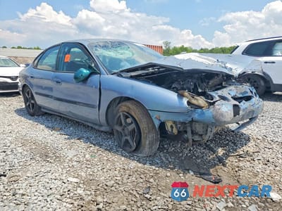 Czwarte zdjęcie samochodu z boku: 1999 FORD TAURUS SE VIN:1FAFP53U2XA116053 - miniatura