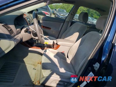 Zdjęcie 7 z 13 samochodu: 2003 TOYOTA CAMRY XLE VIN:4T1BE30K53U664865 - miniatura
