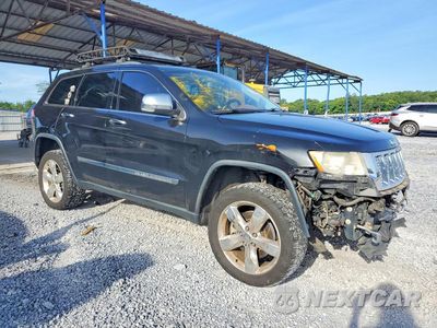 Czwarte zdjęcie samochodu z boku: 2012 JEEP GRAND CHEROKEE OVERLAND VIN:1C4RJFCT6CC304465 - miniatura