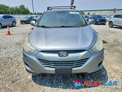 Piąte zdjęcie samochodu w środku: 2010 HYUNDAI TUCSON GLS VIN:KM8JU3AC5AU091968 - miniatura