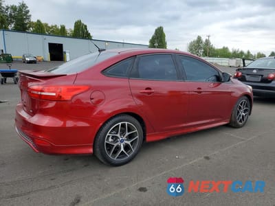 Trzecie zdjęcie samochodu z tyłu: 2015 FORD FOCUS SE VIN:1FADP3F24FL281479 - miniatura