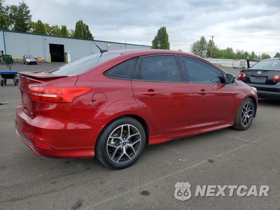 Trzecie zdjęcie samochodu z tyłu: 2015 FORD FOCUS SE VIN:1FADP3F24FL281479 - miniatura