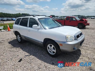 Czwarte zdjęcie samochodu z boku: 2004 HYUNDAI SANTA FE GLS VIN:KM8SC13D74U699528 - miniatura