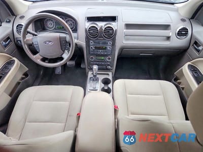 Zdjęcie 8 z 12 samochodu: 2009 FORD TAURUS X SEL VIN:1FMDK02W79GA02454 - miniatura