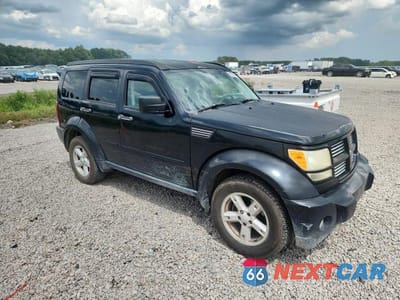 Czwarte zdjęcie samochodu z boku: 2010 DODGE NITRO SXT VIN:1D4PT5GK1AW105027 - miniatura