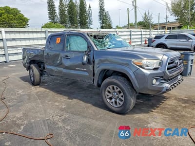Czwarte zdjęcie samochodu z boku: 2016 TOYOTA TACOMA SR5 V6 VIN:3TMAZ5CN4GM023464 - miniatura