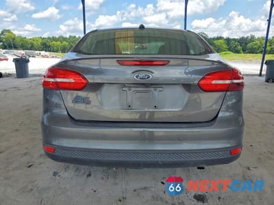 Zdjęcie 6 z 12 samochodu: 2018 FORD FOCUS SEL VIN:1FADP3H25JL256127 - miniatura