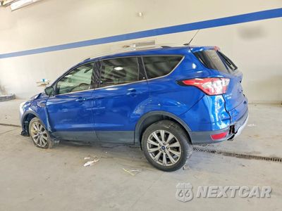 Drugie zdjęcie samochodu z przodu: 2017 FORD ESCAPE TITANIUM VIN:1FMCU0J99HUE43889 - miniatura