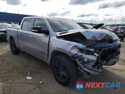Czwarte zdjęcie samochodu z boku: 2021 RAM 1500 BIG HORN/LONE STAR VIN:1C6SRFFT4MN516879 - miniatura