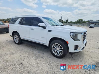 Czwarte zdjęcie samochodu z boku: 2022 GMC YUKON SLT VIN:1GKS1BKT6NR188927 - miniatura