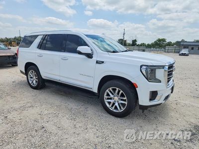 Czwarte zdjęcie samochodu z boku: 2022 GMC YUKON SLT VIN:1GKS1BKT6NR188927 - miniatura