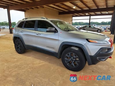 Czwarte zdjęcie samochodu z boku: 2015 JEEP CHEROKEE TRAILHAWK VIN:1C4PJMBS3FW680872 - miniatura