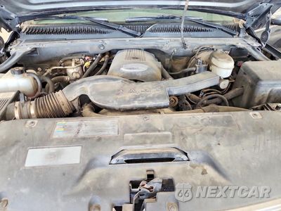 Zdjęcie 12 z 13 samochodu: 2003 CHEVROLET TAHOE K1500 VIN:1GNEK13V13J116617 - miniatura