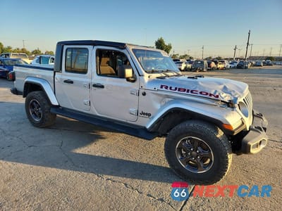 Czwarte zdjęcie samochodu z boku: 2022 JEEP GLADIATOR SPORT VIN:1C6HJTAGXNL138672 - miniatura
