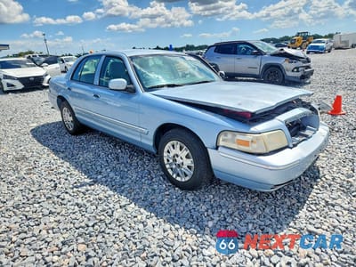 Czwarte zdjęcie samochodu z boku: 2007 MERCURY GRAND MARQUIS GS VIN:2MEFM74V77X634977 - miniatura