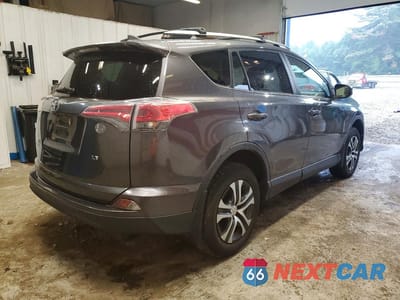 Trzecie zdjęcie samochodu z tyłu: 2017 TOYOTA RAV4 LE VIN:JTMZFREV6HJ706099 - miniatura
