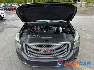 Zdjęcie 7 z 10 samochodu: 2016 GMC YUKON DENALI VIN:1GKS2CKJ1GR129613 - miniatura