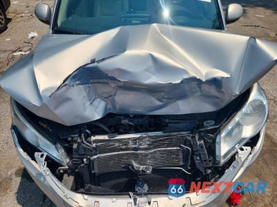 Zdjęcie 11 z 12 samochodu: 2010 VOLKSWAGEN TIGUAN SE VIN:WVGBV7AXXAW510350 - miniatura
